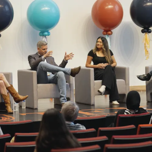 a group of people sitting in chairs