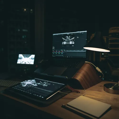 a desk with a computer and a keyboard