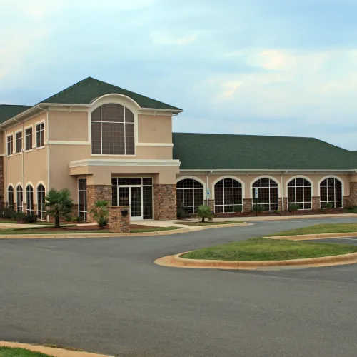 a large building with a green roof