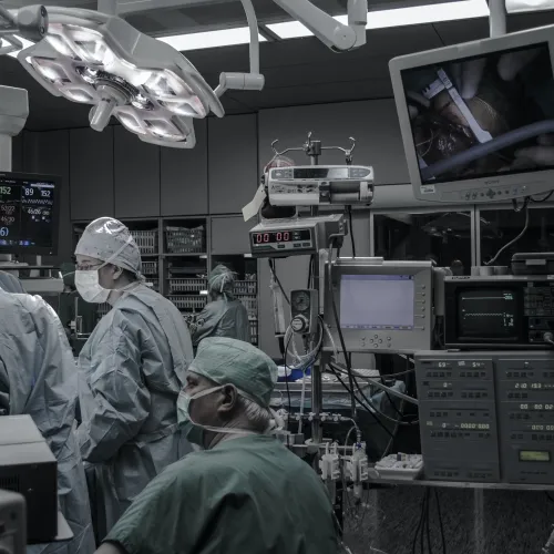 a group of people in an operation room