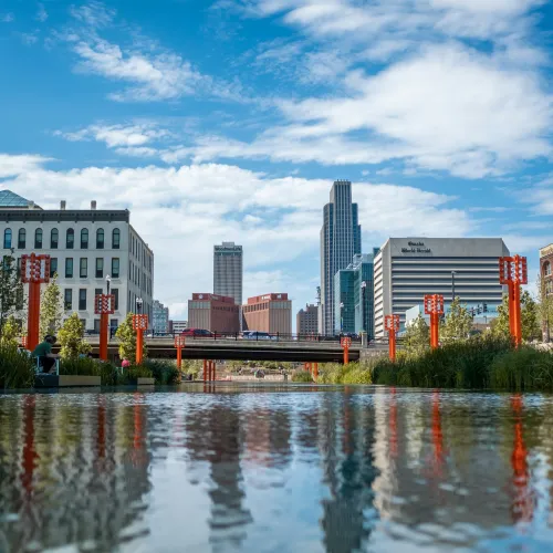 a body of water with buildings around it