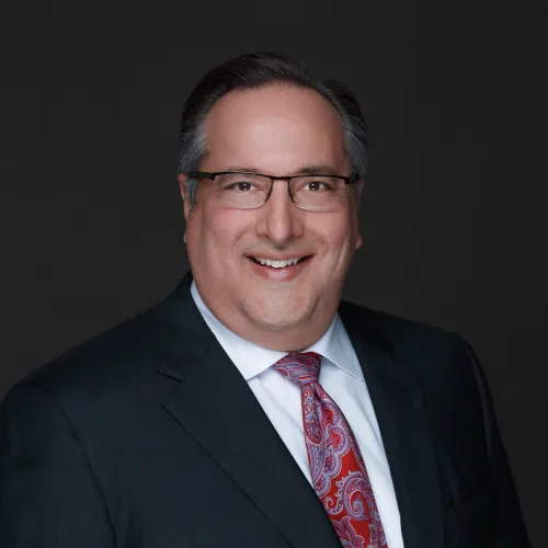 a man wearing a suit and tie
