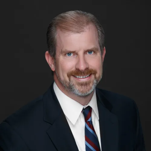 a man in a suit and tie