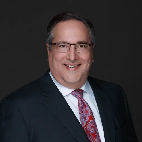a man wearing a suit and tie