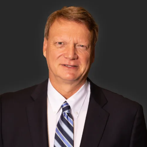a man in a suit and tie
