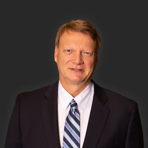 a man in a suit and tie