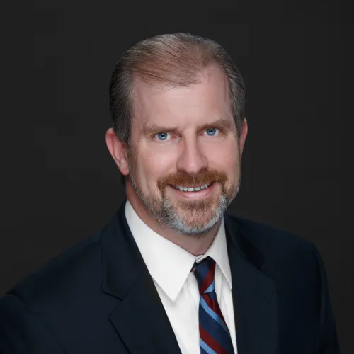 a man in a suit and tie