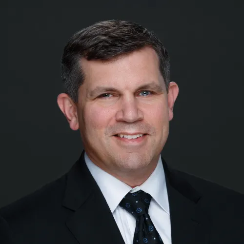 a man in a suit and tie