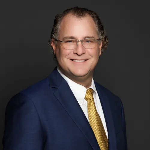 a man in a suit and tie