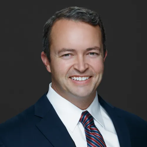 a man in a suit and tie