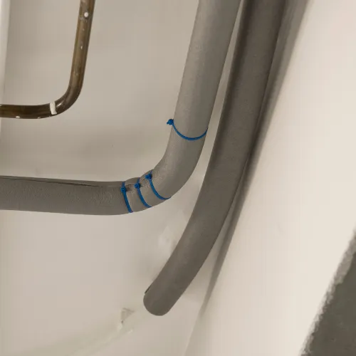 a close-up of a white pipe