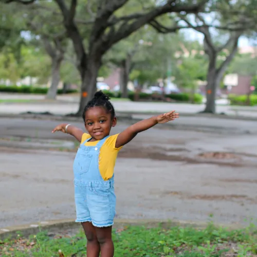 a child standing on a concrete block