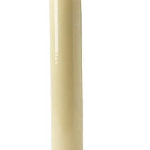 Single beige cylindrical candle standing upright on a white background