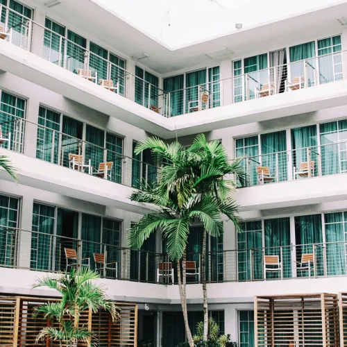 a building with palm trees