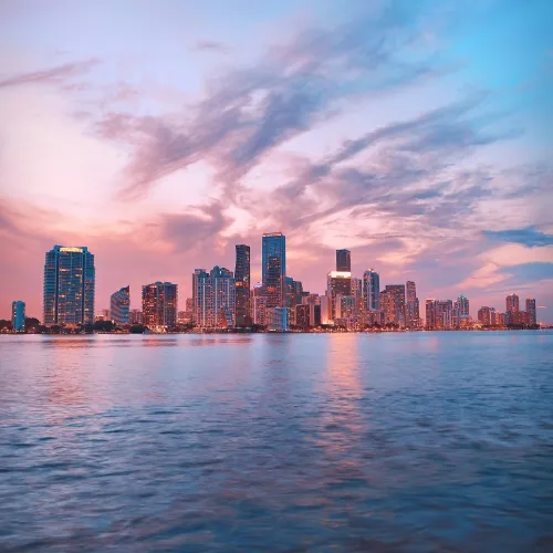 a city skyline across the water