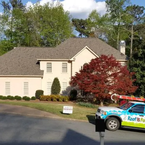 a truck parked outside of a house