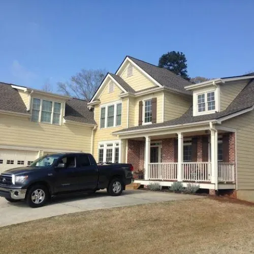 a car parked in front of a house