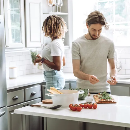 a person and a child preparing food