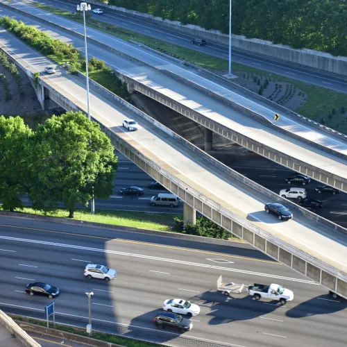 a highway with cars on it