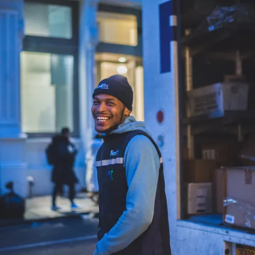 a man smiling outside