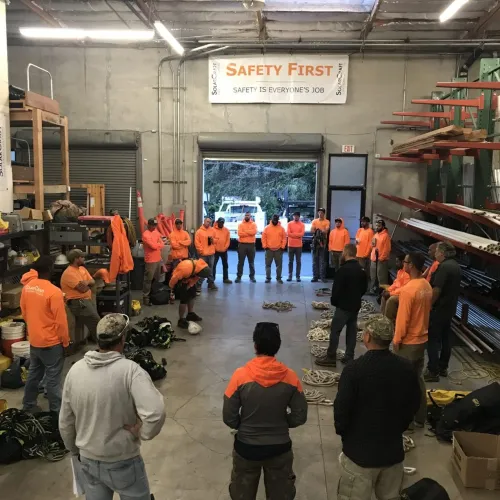 a group of people in a warehouse
