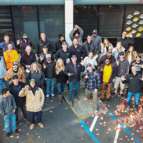 a group of people posing for a photo