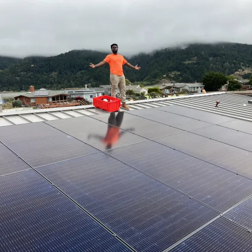 a man jumping on a roof