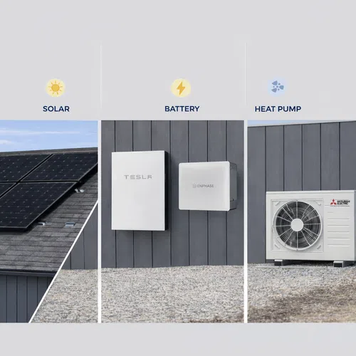 Solar panels on roof, Tesla and Enphase battery units on wall, Mitsubishi heat pump outside grey building