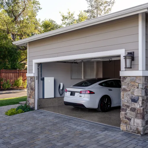 a white car parked in a driveway