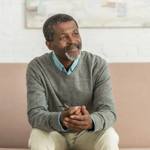 a man sitting on a couch