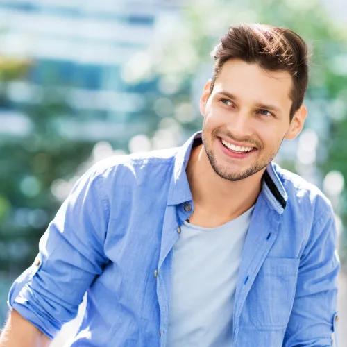 a man smiling for the camera