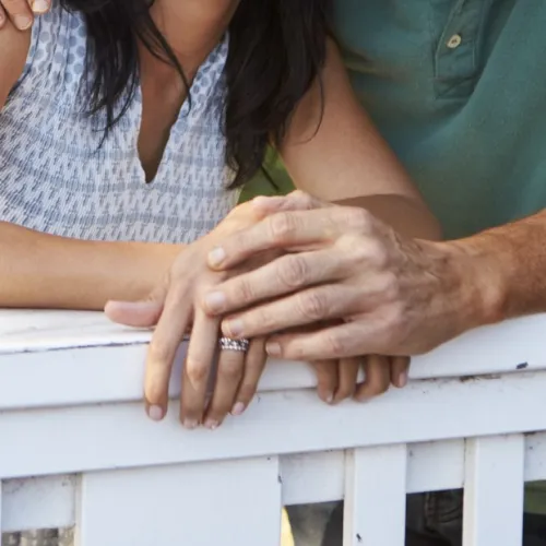 a woman holding her hands together