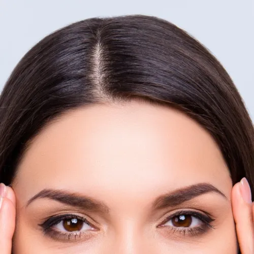 a close up of a woman's face