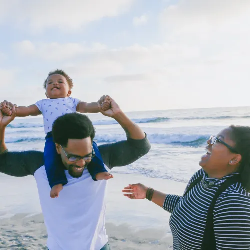 young family on beach