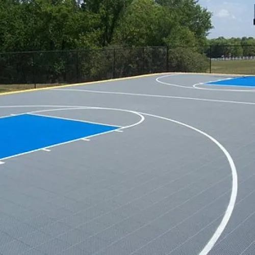 a basketball court with a basketball hoop