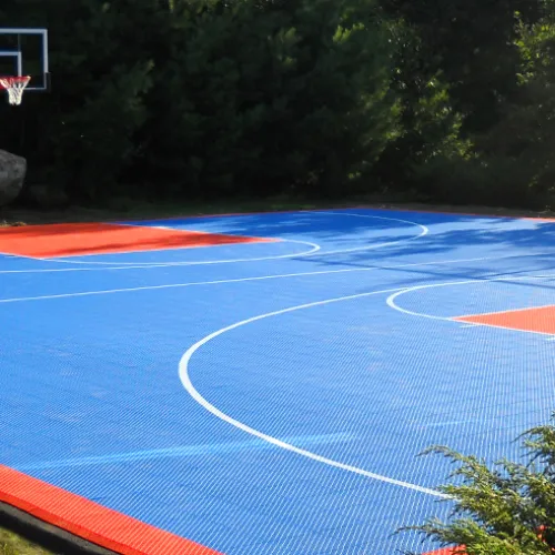a swimming pool with a red and blue track