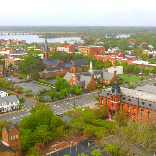 a city with many buildings and trees