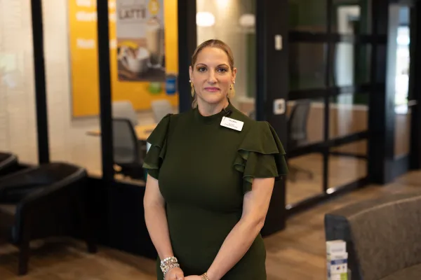 a woman in a green shirt