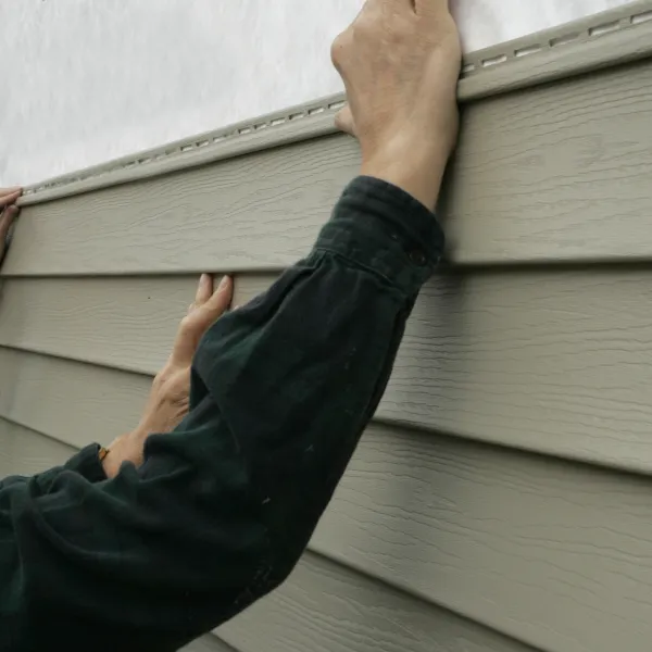 a man standing in front of a building