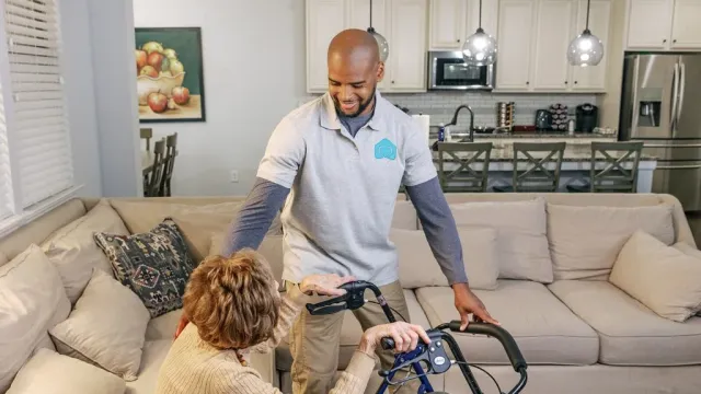 a man and a woman with a vacuum cleaner