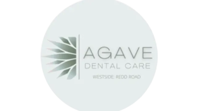 Agave Dental Care logo with stylized agave plant icon and text on light circular background.