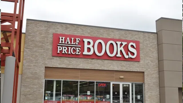 Storefront of Half Price Books with large red and white sign above entrance showcasing books, games, music, and movies.