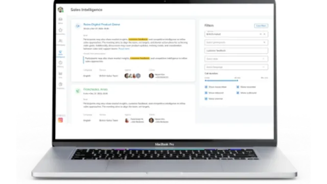 MacBook Pro displaying a sales intelligence dashboard with product demos, filters, and team collaboration details.
