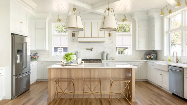 a kitchen with white cabinets