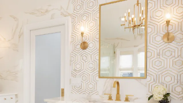 a bathroom with a large mirror