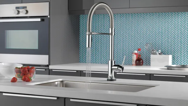 a kitchen with a sink and a faucet