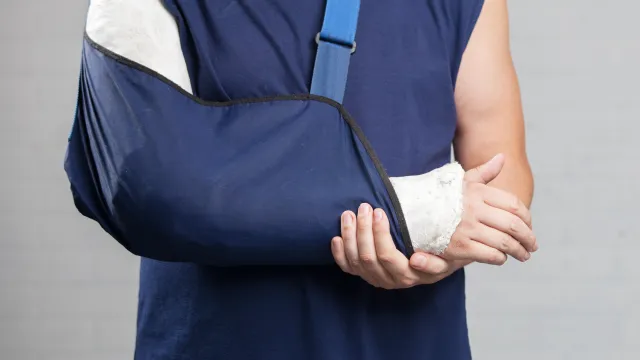 a person in a sling