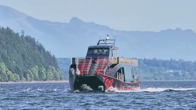 a small boat in a large body of water