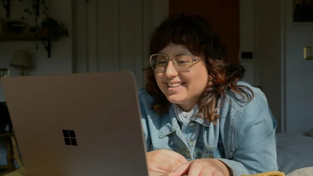 a woman using a laptop