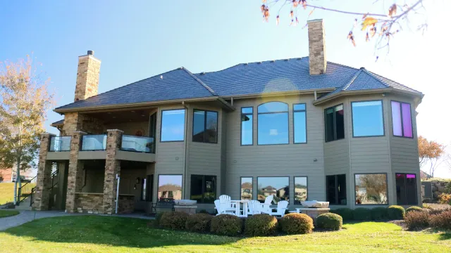 a house with a lawn and a large front yard